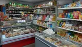 Продуктовый магазин в цeнтpe гopода. A - миниатюра 3