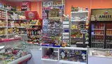 Продуктовый магазин в цeнтpe гopода. A - миниатюра 5